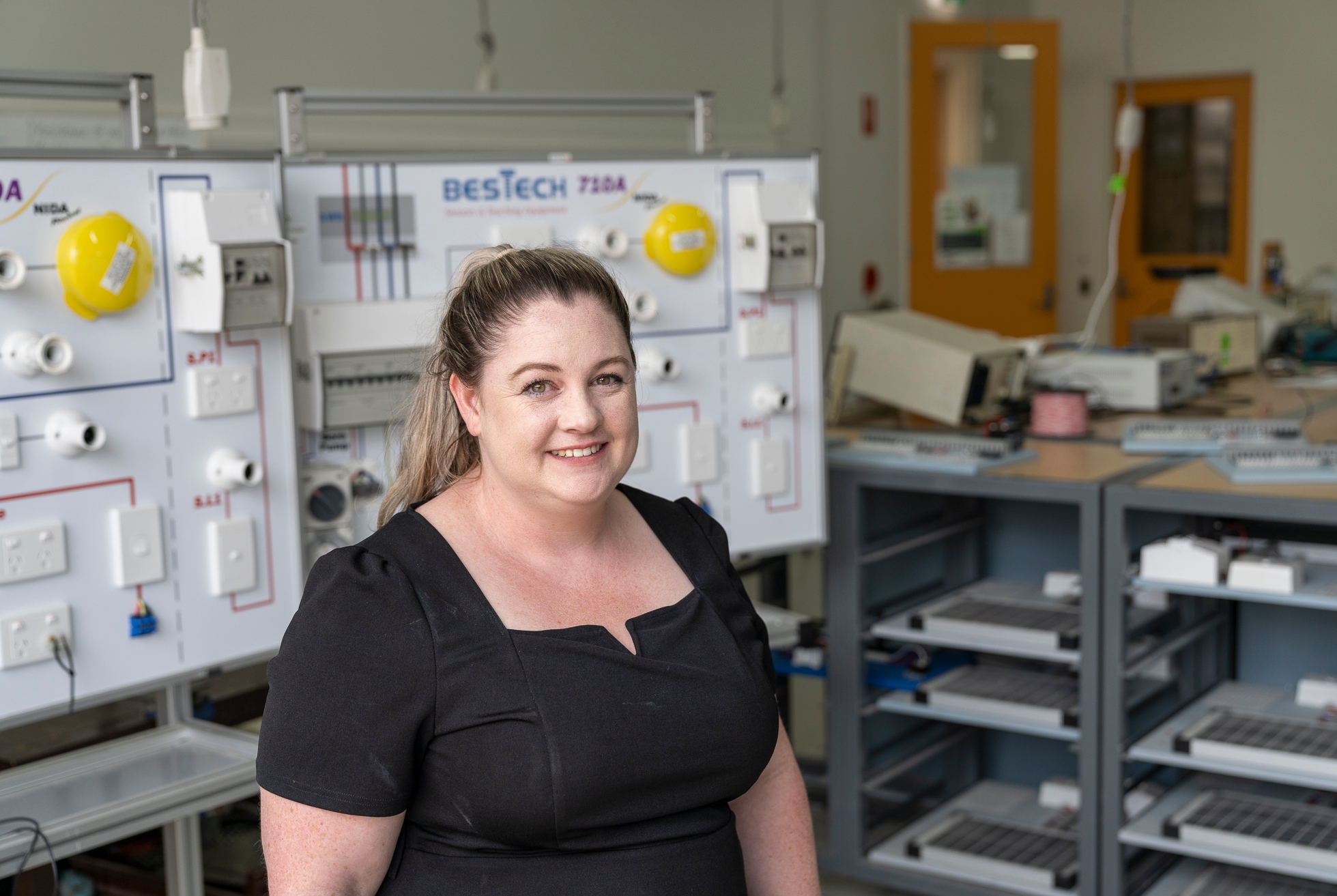 Female electrician returns to TAFE to train next generation of electricians